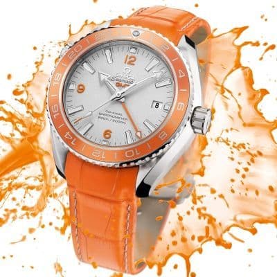 Omega выпустила часы из платины с оранжевой керамикой