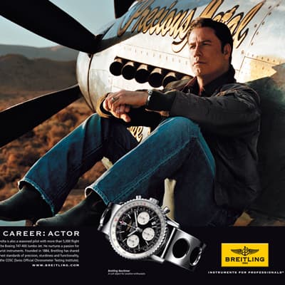 Джон Траволта летает в часах Breitling